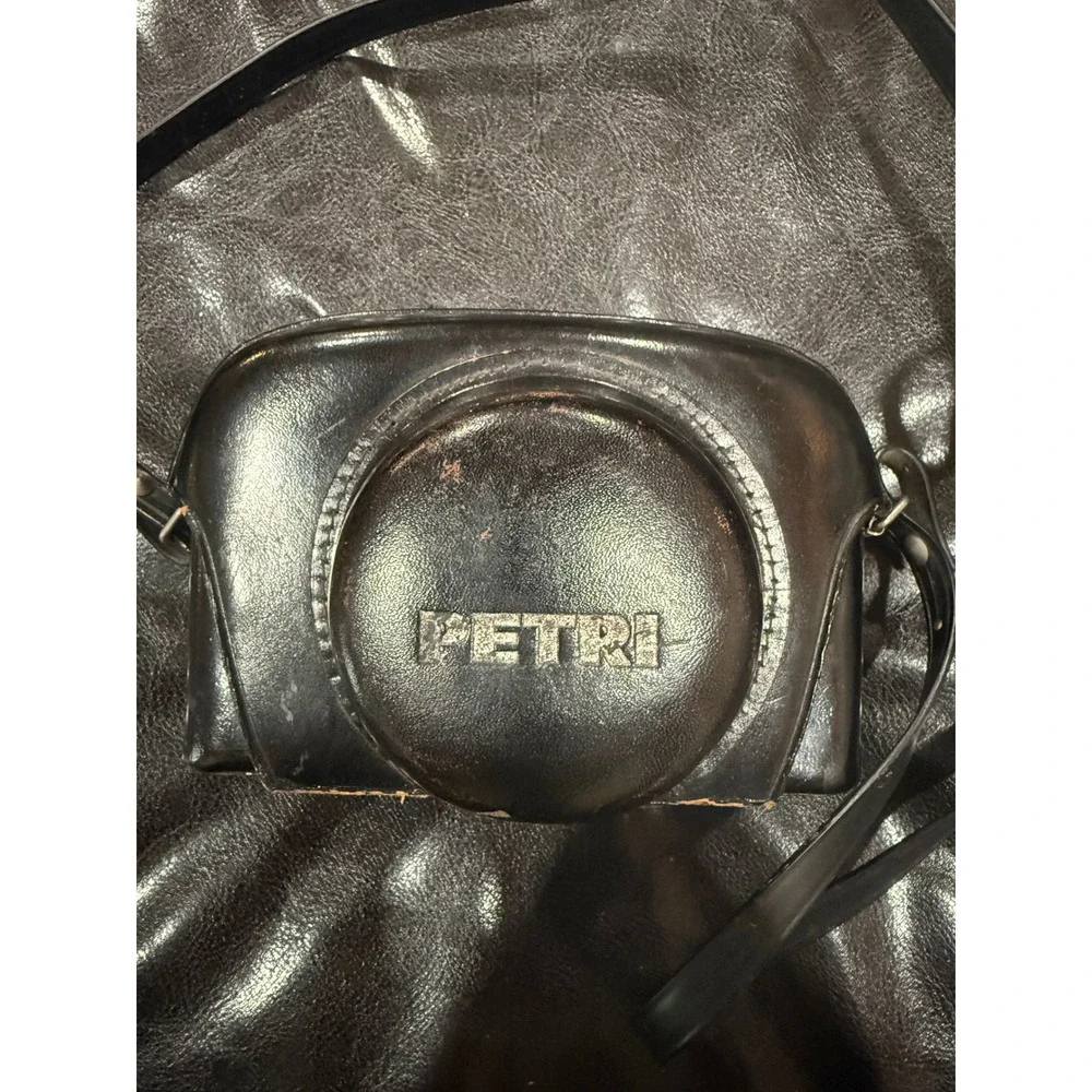 Petri 7 S Circle-Eye System 35mm Rangefinder Camera with 45mm f2.8 Lens and Case
